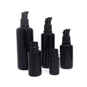 کاسمیٹکس کے لئے مالکیون کے ساتھ سیاہ گلاس جار